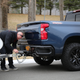 Chevy Performance Engineer Aaron Pfau hooking a trailer up to the Silverado.